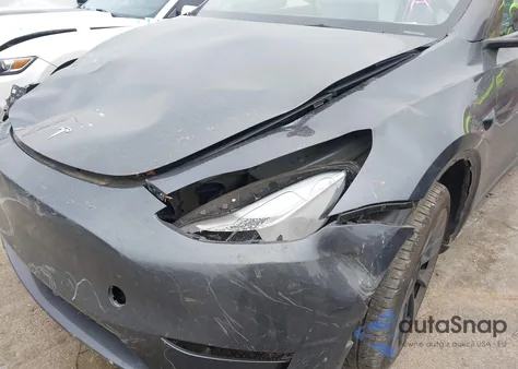 2023 Tesla Model Y Awd/Long Range Dual Motor All-Wheel Drive z USA, uszkodzony, nr VIN 7SAYGAEE5PF903249